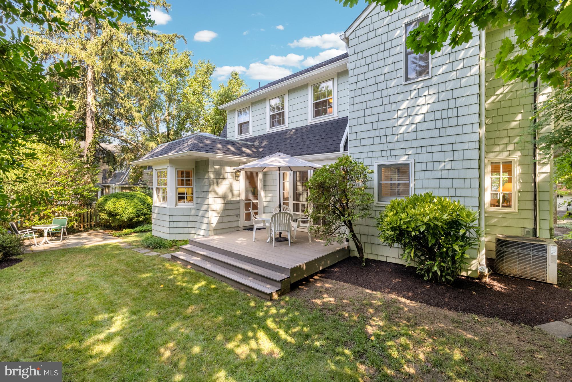 3514 Shepherd Street Chevy Chase, MD 20815 - Photo 34 of 42 a view of patio with a table and chairs under an umbrella