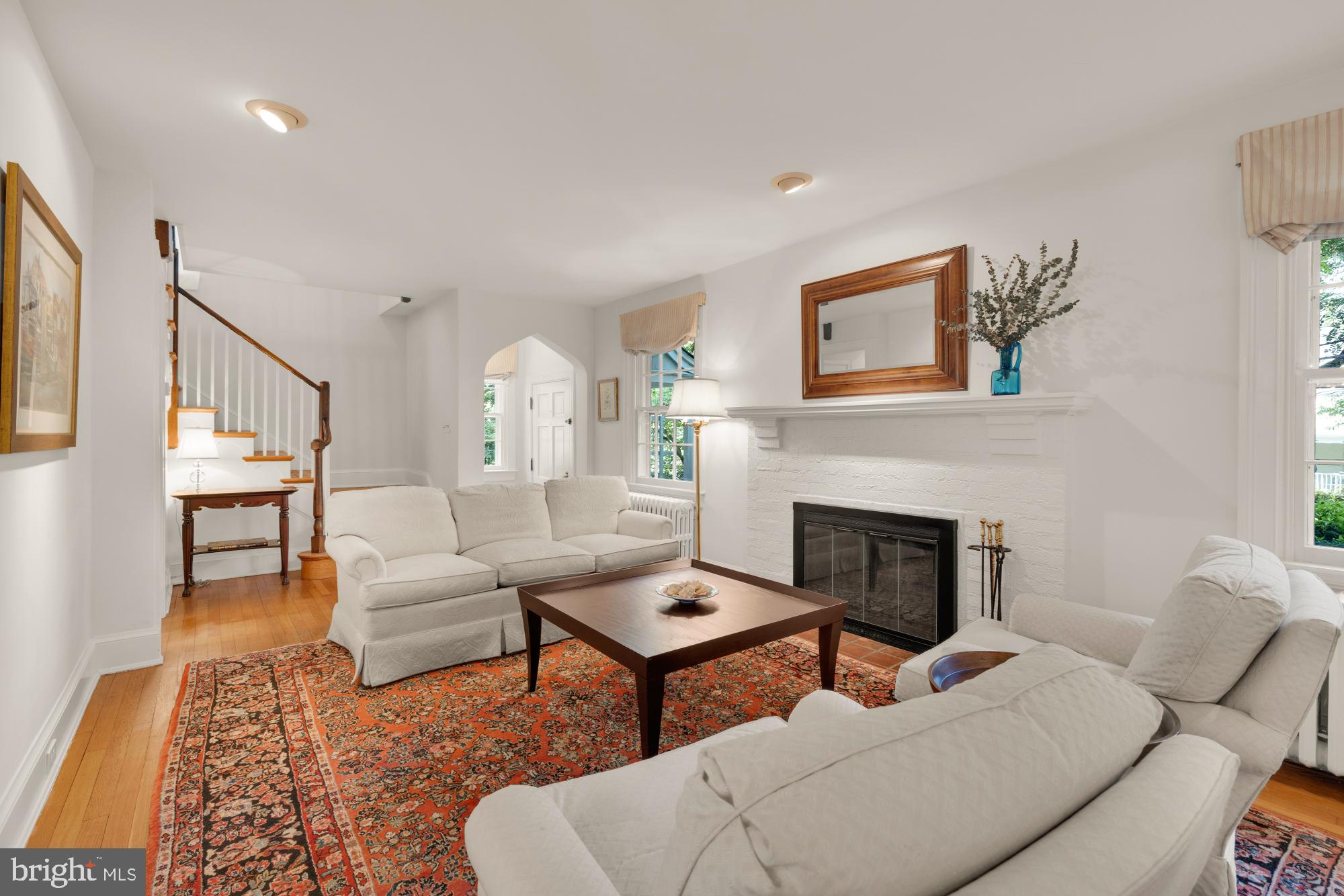 3514 Shepherd Street Chevy Chase, MD 20815 - Photo 4 of 42 a living room with furniture and a fireplace
