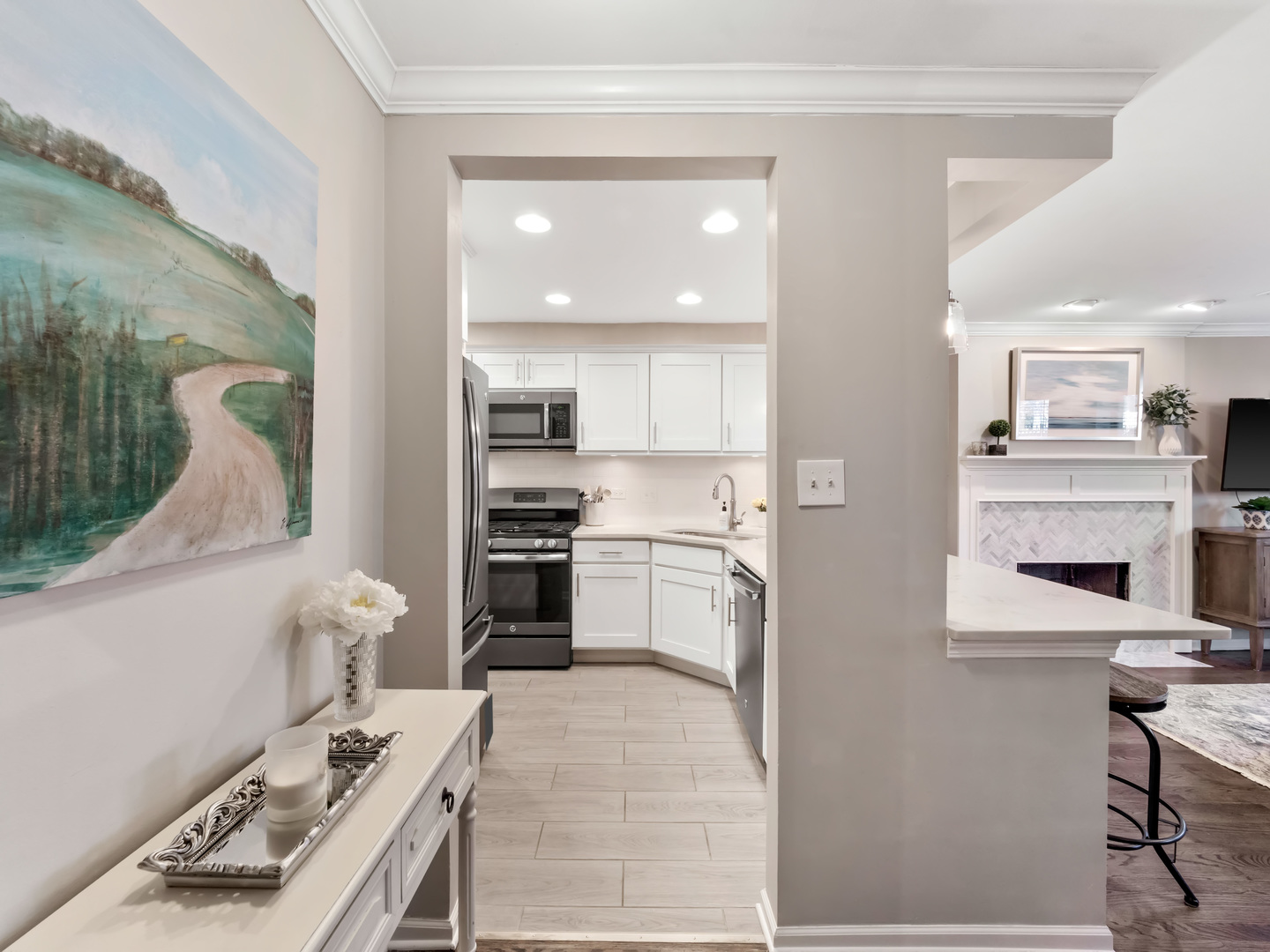 2439 North Burling Street, Unit G Chicago, IL 60614 - Photo 3 of 20 a kitchen with a sink appliances and cabinets