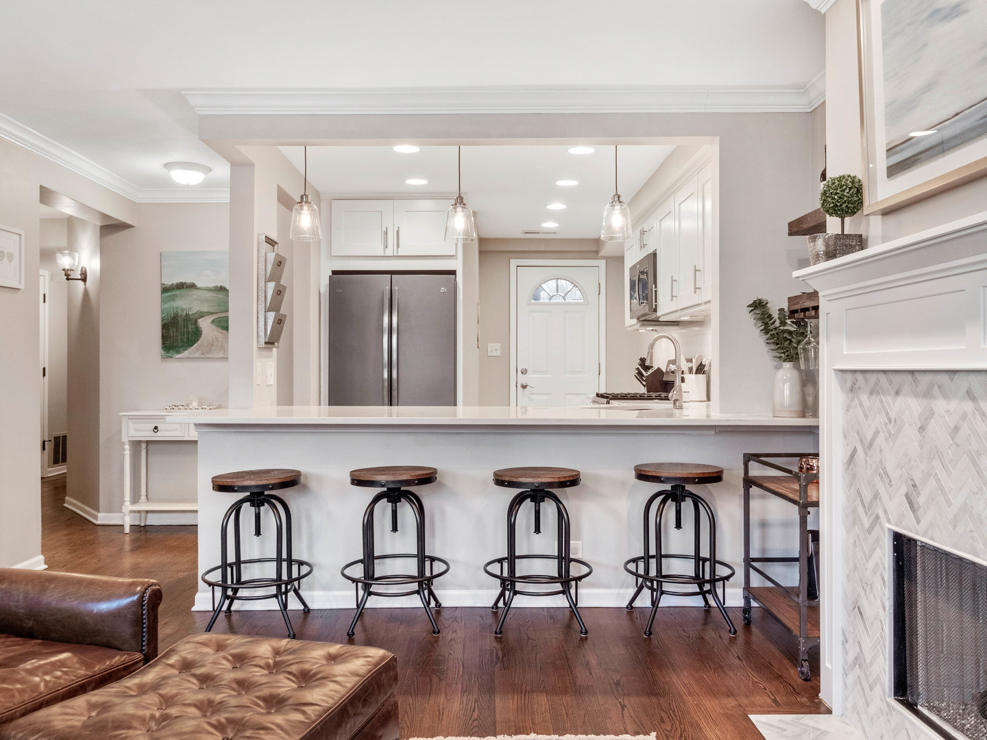 2439 North Burling Street, Unit G Chicago, IL 60614 - Photo 8 of 20 a view of living room filled with furniture and wooden floor