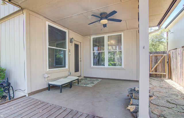 7712 Earp Way Austin, TX 78729 - Photo 32 of 37 a living room with furniture and a window
