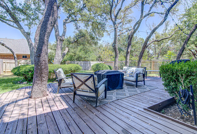 7712 Earp Way Austin, TX 78729 - Photo 33 of 37 a view of a backyard with sitting area