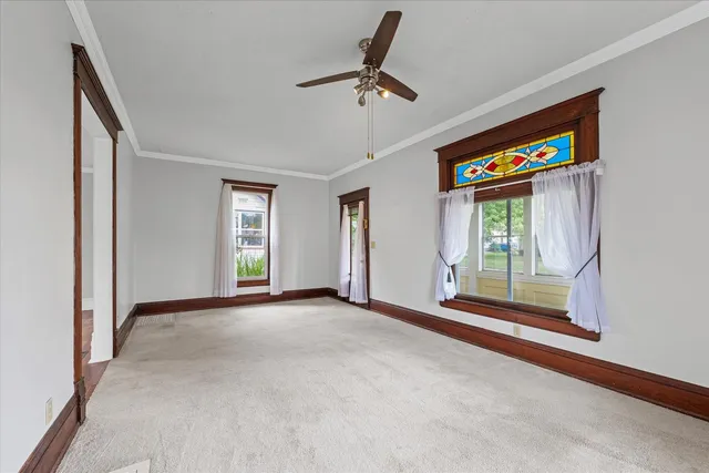 a view of an empty room with a window