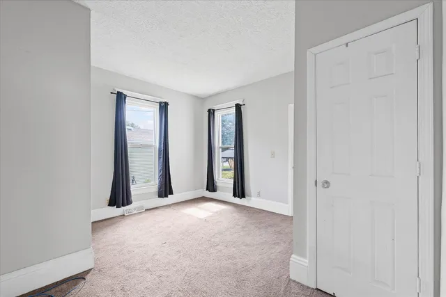 an empty room with closet