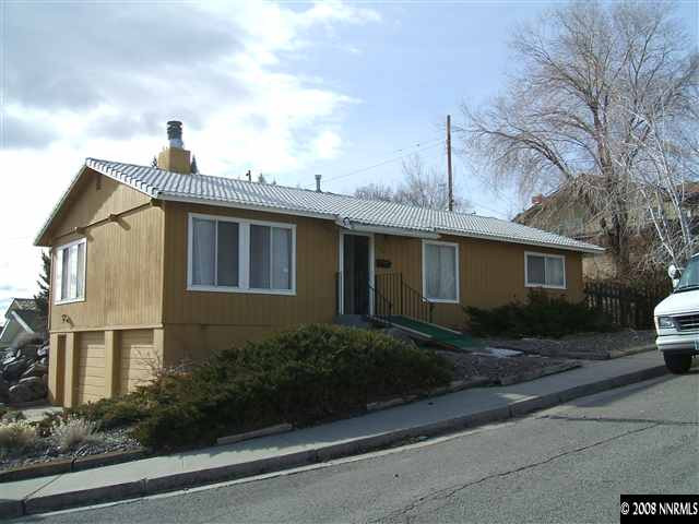 400 Talus Way Reno, NV 89503 - Photo 1 of 8 a front view of a house with a yard