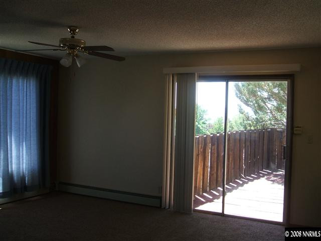 400 Talus Way Reno, NV 89503 - Photo 6 of 8 wooden floor in an empty room with a window