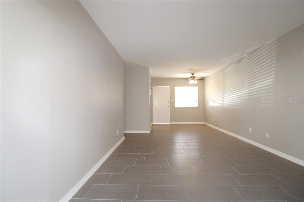3001 Bee Ridge Road, Unit 121 Sarasota, FL 34239 - Photo 5 of 19 a view of an empty room and a window