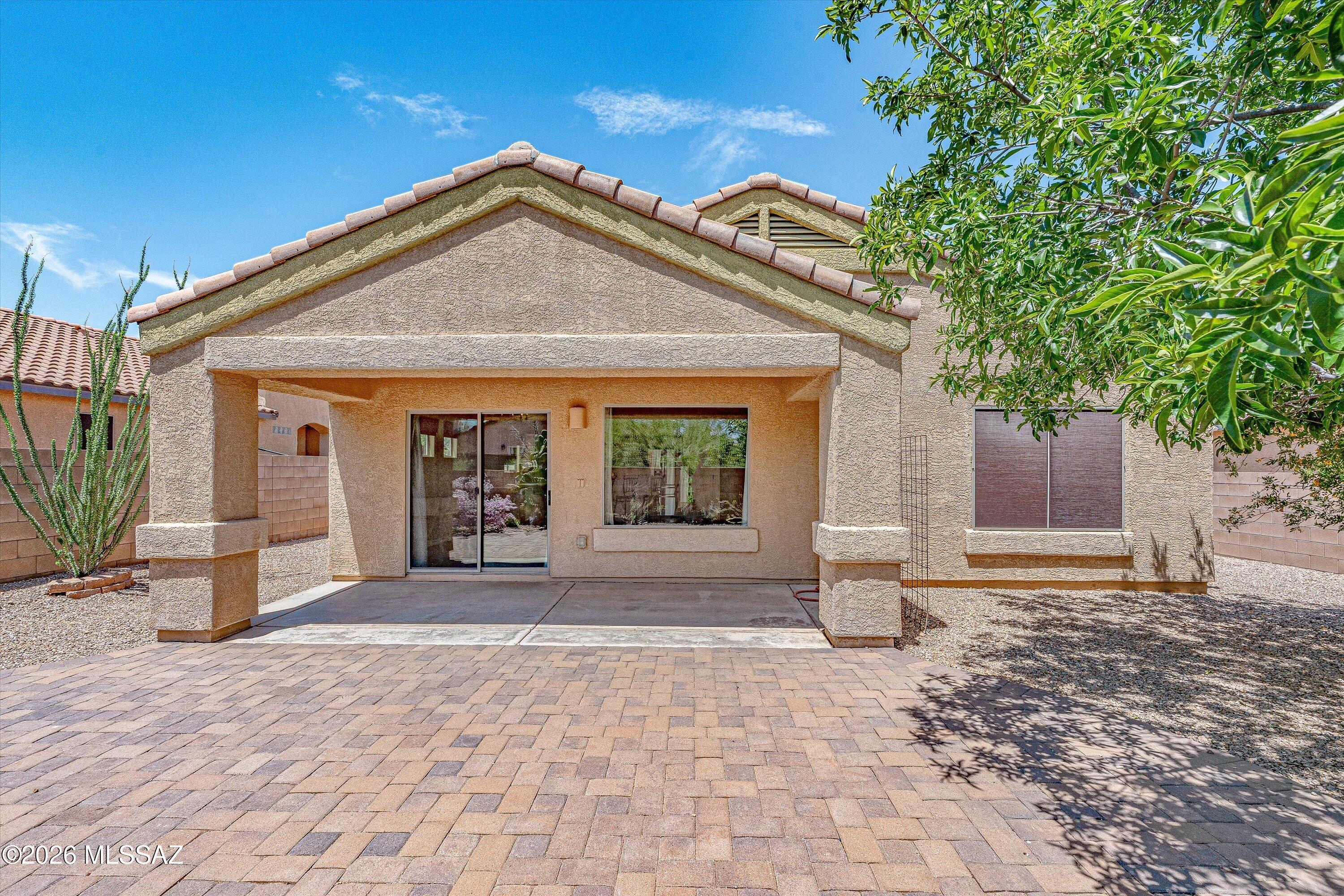 513 South Stone Bench Road Vail, AZ 85641 - Photo 32 of 39 Rear exterior showcasing low-maintenance backyard.