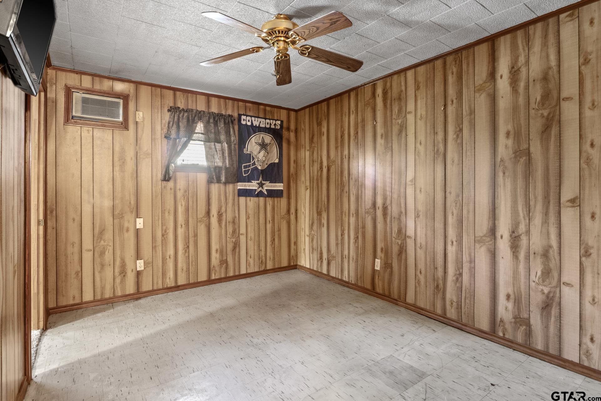 71 Private Road Pittsburg, TX 75686 - Photo 14 of 39 a view of a hallway with a chandelier fan