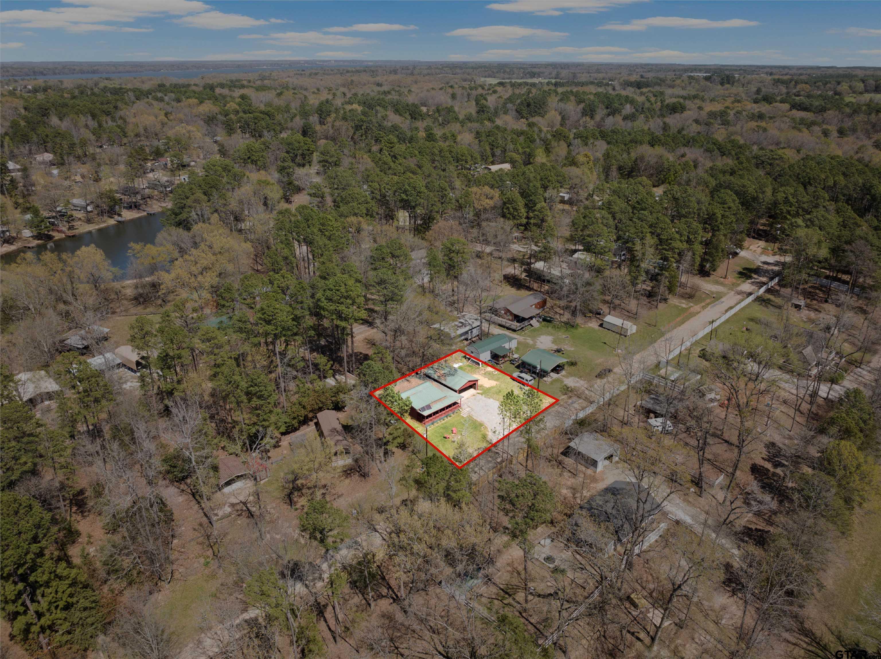 71 Private Road Pittsburg, TX 75686 - Photo 35 of 39 a view of a city with lush green forest