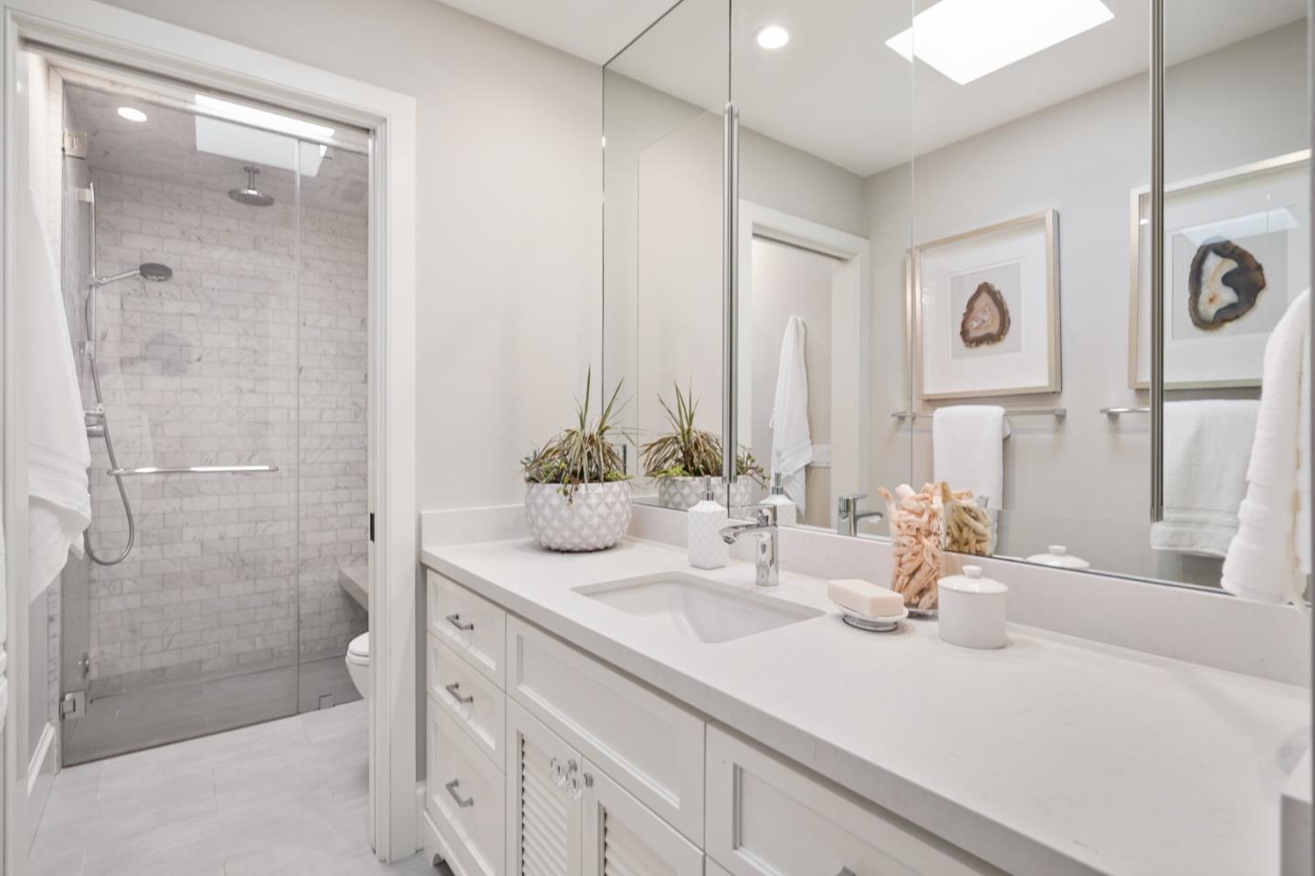 208 Bentley Square Mountain View, CA 94040 - Photo 8 of 17 a bathroom with a sink and a mirror