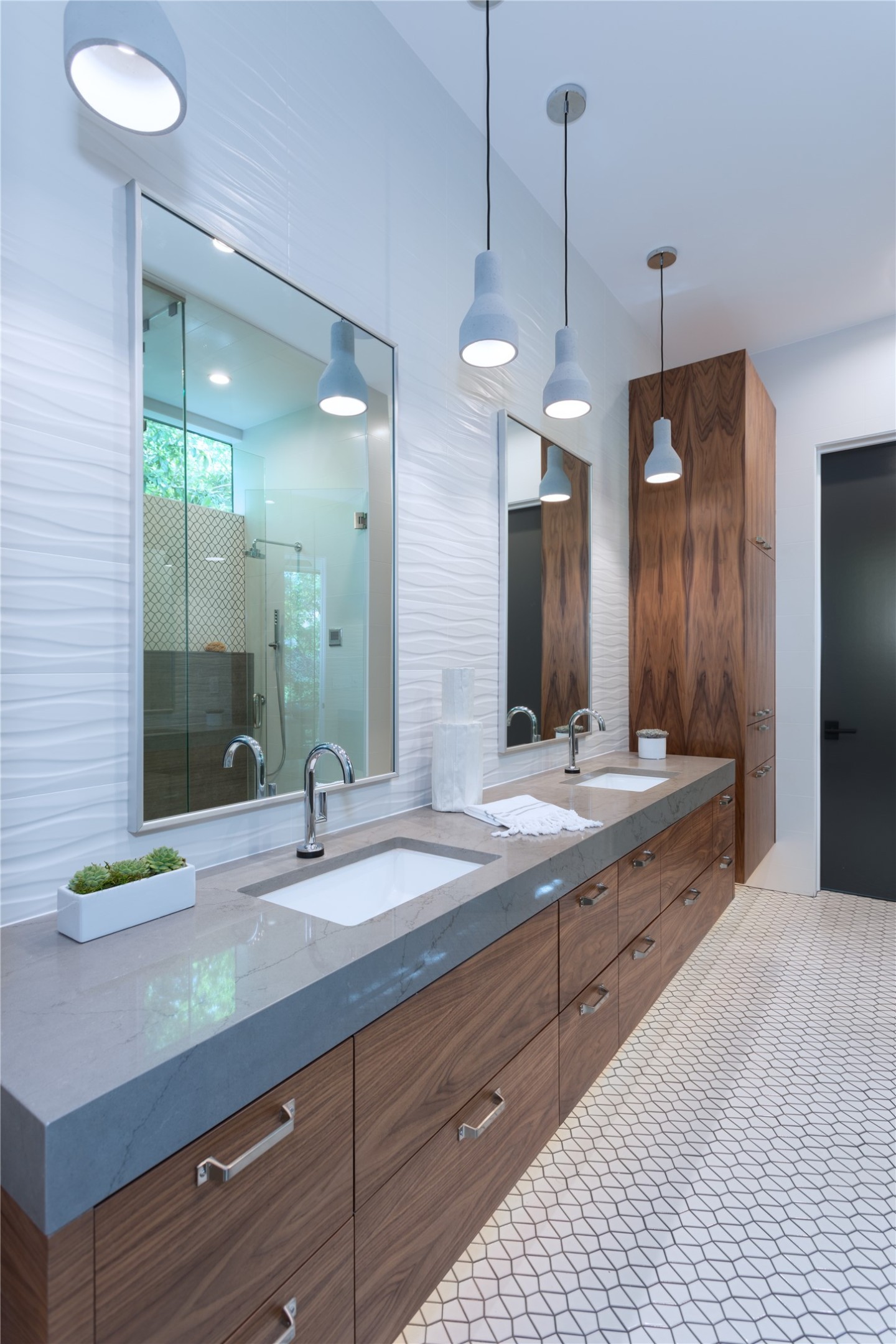 700 Jessie Street Austin, TX 78704 - Photo 13 of 40 Full bathroom featuring double vanity and a stall shower