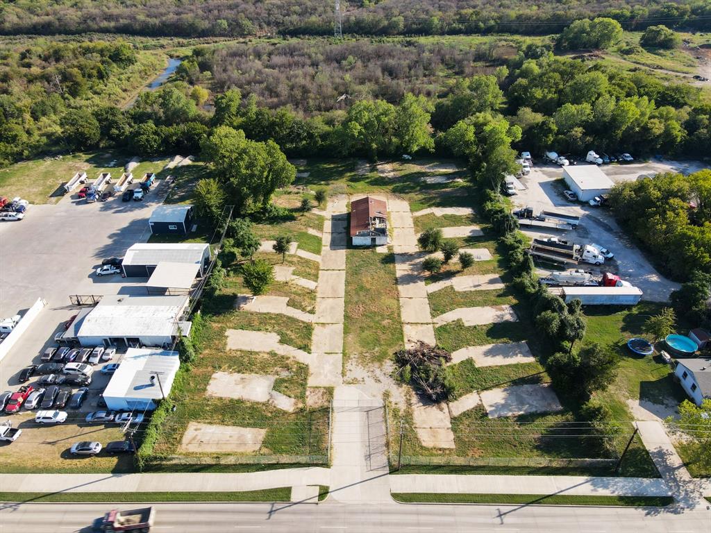 2625 West Hunter Ferrell Road Grand Prairie, TX 75050 - Photo 2 of 9 an aerial view of residential houses with outdoor space