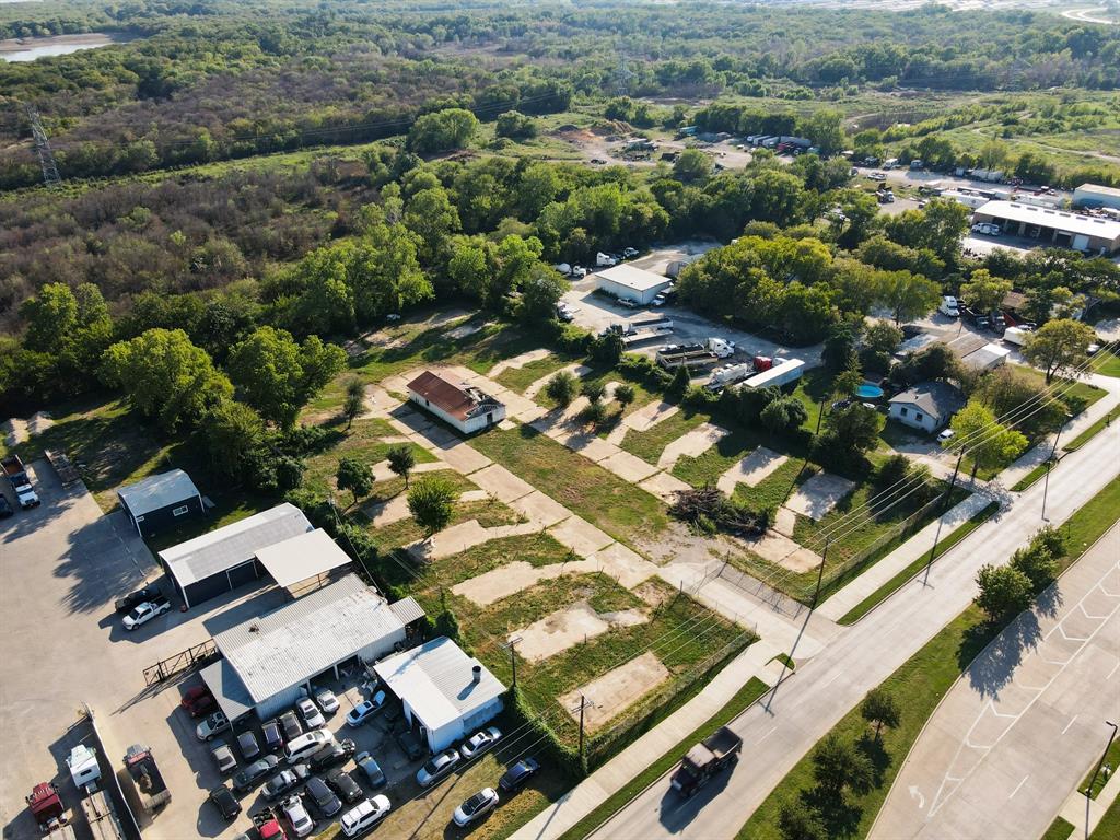 2625 West Hunter Ferrell Road Grand Prairie, TX 75050 - Photo 4 of 9 an aerial view of residential houses with outdoor space