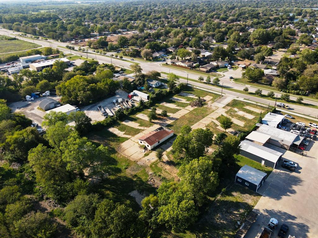 2625 West Hunter Ferrell Road Grand Prairie, TX 75050 - Photo 6 of 9 an aerial view of residential houses with outdoor space