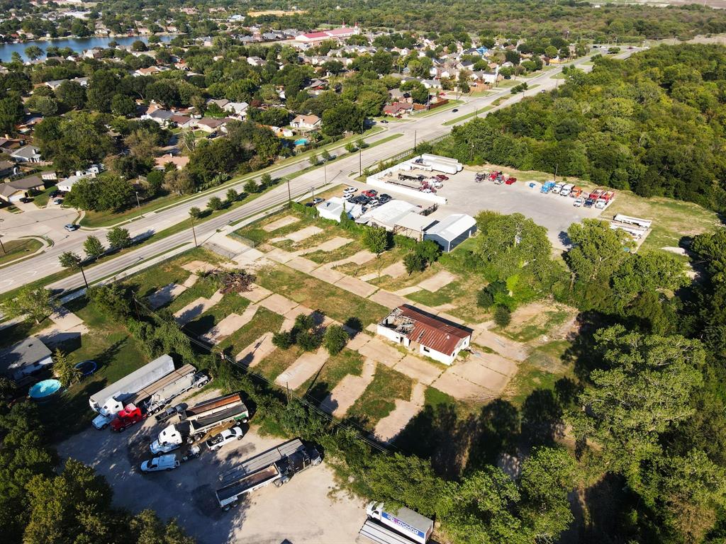 2625 West Hunter Ferrell Road Grand Prairie, TX 75050 - Photo 7 of 9 an aerial view of residential houses with outdoor space