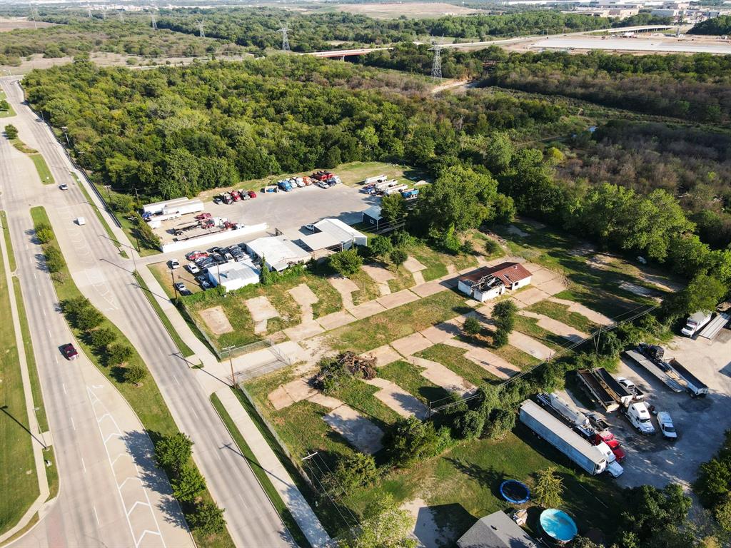 2625 West Hunter Ferrell Road Grand Prairie, TX 75050 - Photo 9 of 9 an aerial view of residential houses with outdoor space