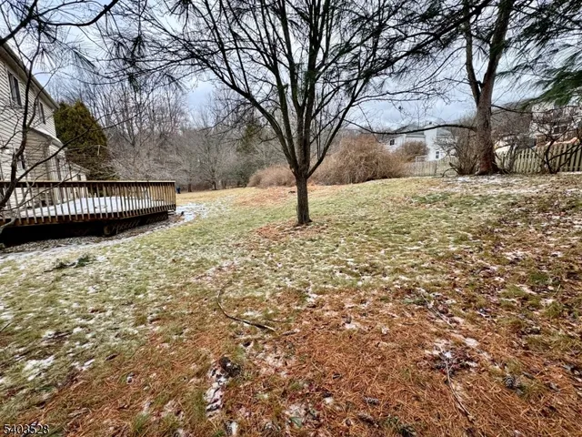 a view of snow covered with snow in front of house