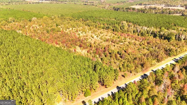 a view of beach and an ocean
