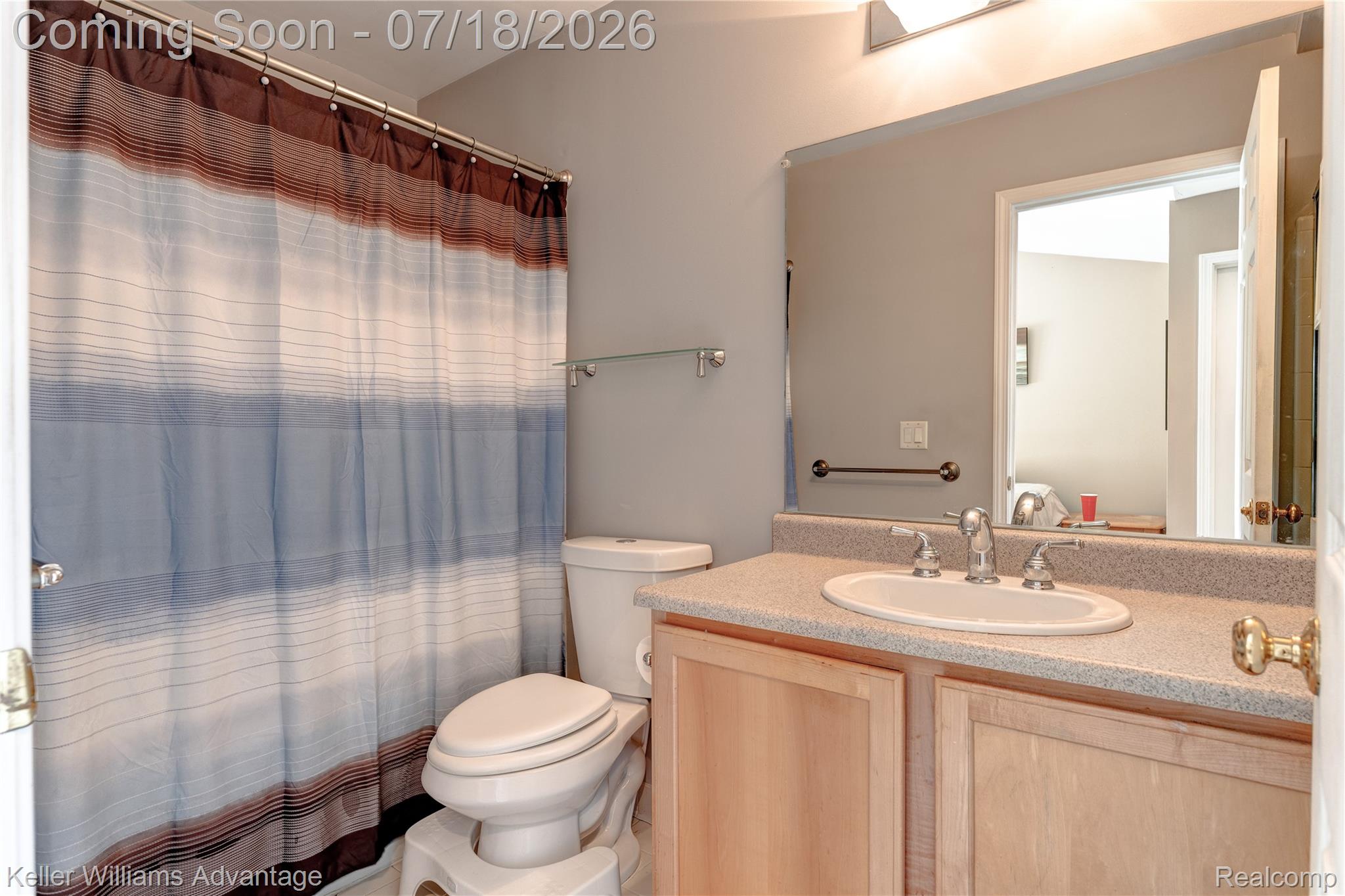 41647 Mitchell Road Novi, MI 48377 - Photo 34 of 43 Bathroom vanity with a light-toned countertop, an integrated sink, and a chrome faucet