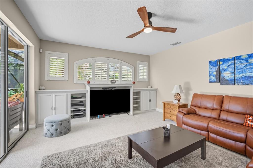 6107 Ibispark Drive Lithia, FL 33547 - Photo 14 of 42 a living room with furniture