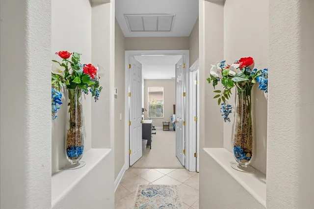 a hallway with beautiful flowers