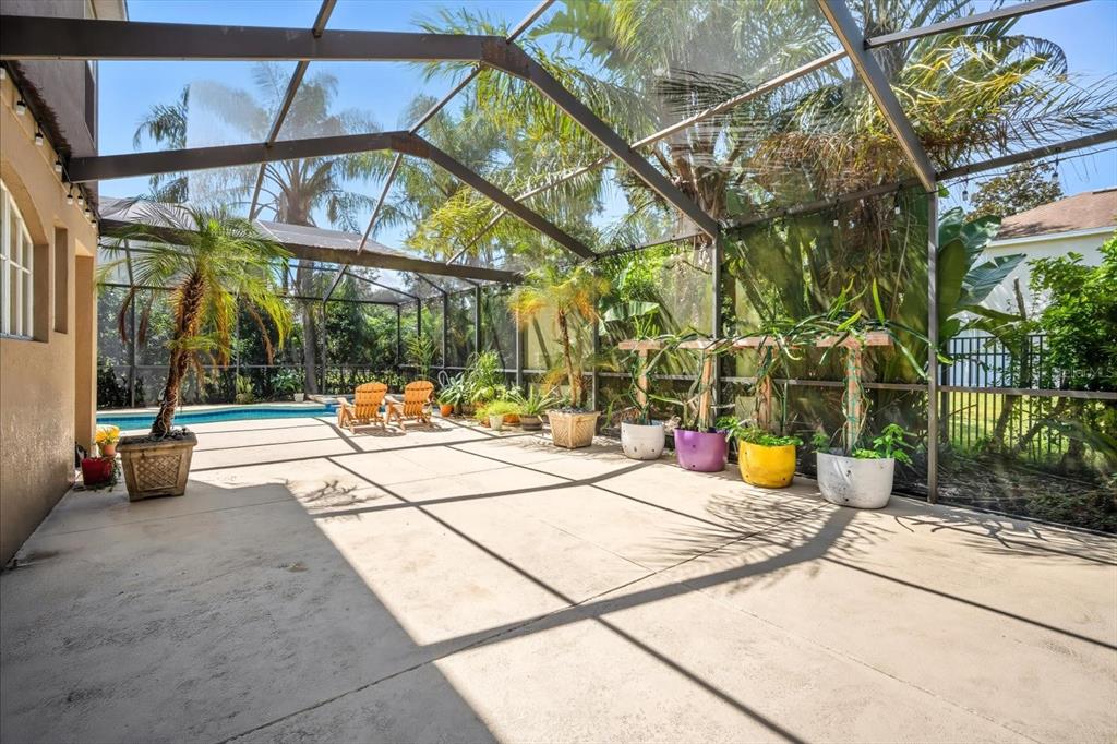 6107 Ibispark Drive Lithia, FL 33547 - Photo 31 of 42 a view of a building with sitting area