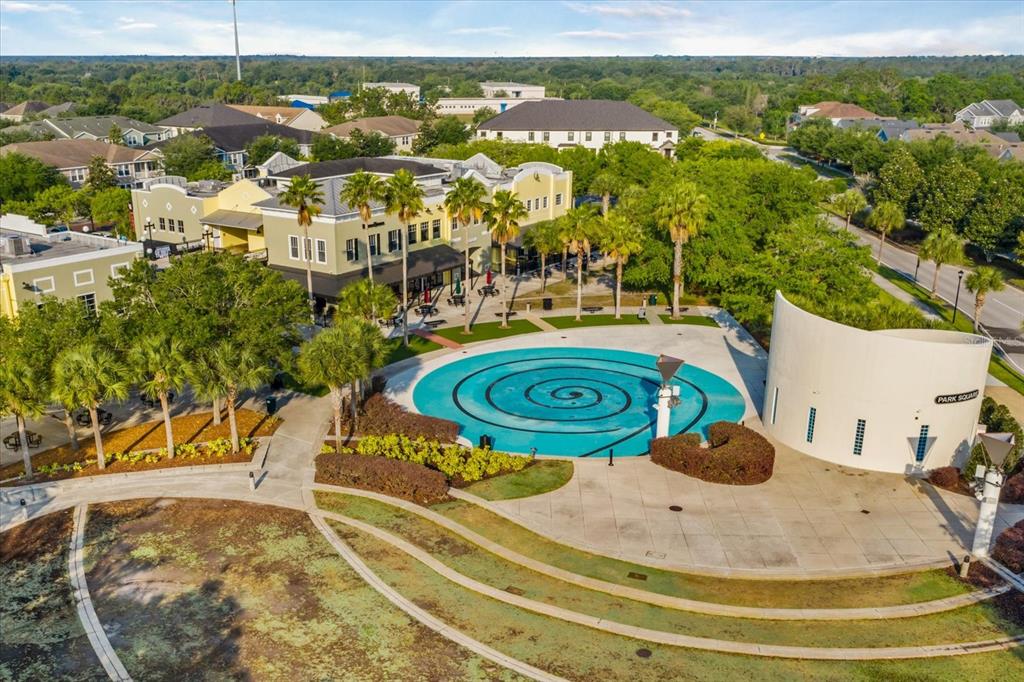 6107 Ibispark Drive Lithia, FL 33547 - Photo 38 of 42 a view of a swimming pool with a chairs