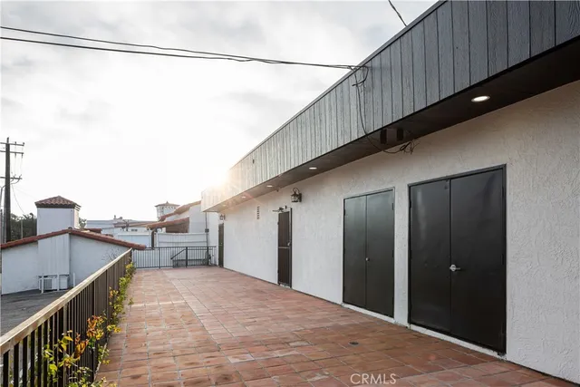 a view of balcony with furniture