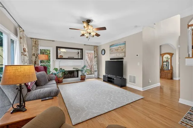 a kitchen with stainless steel appliances a refrigerator sink and cabinets