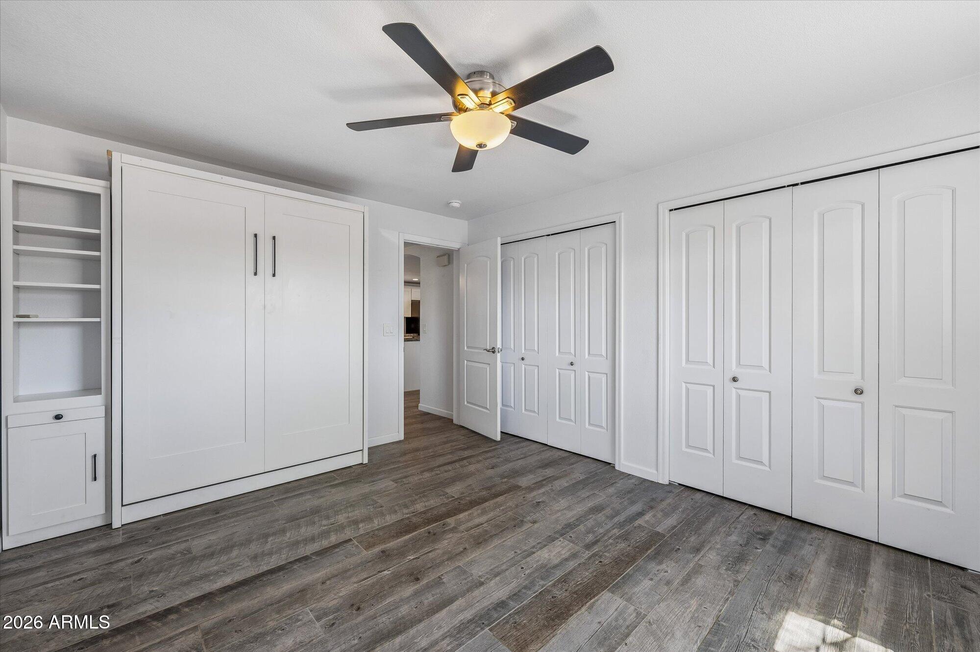 2218 East Yale Street Phoenix, AZ 85006 - Photo 25 of 35 a view of an empty room with wooden floor