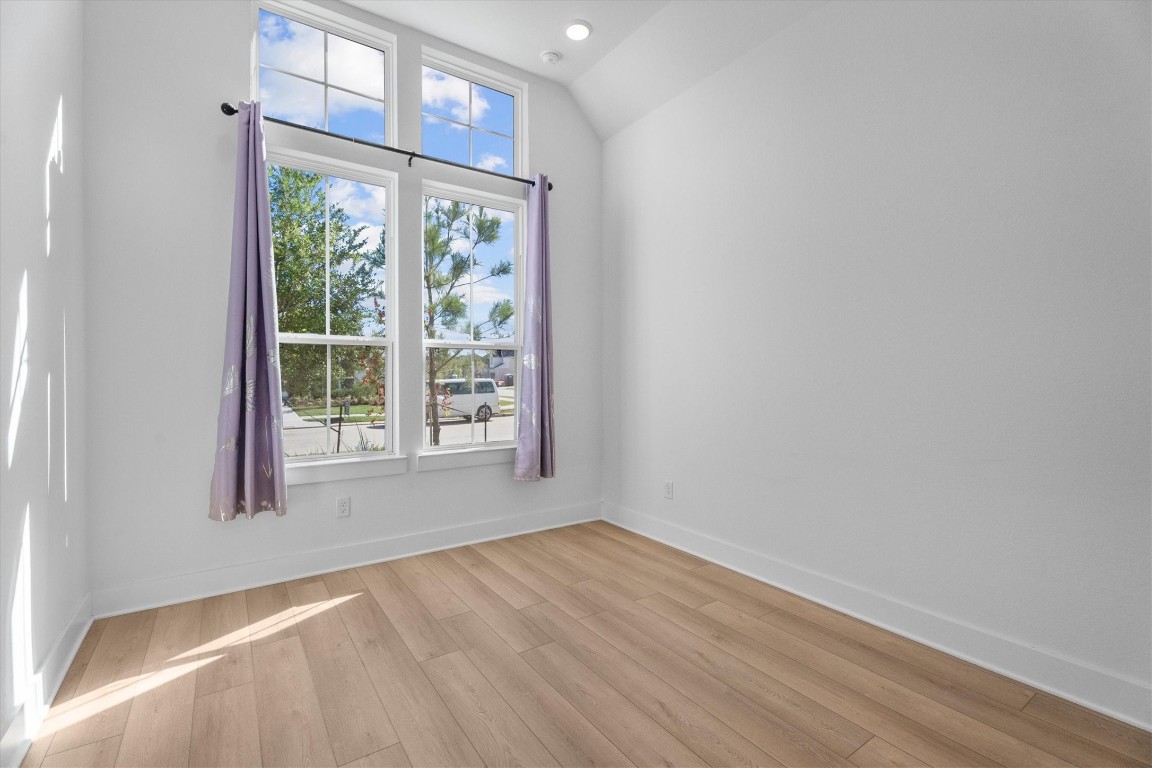 5030 Vly Wind Court Spring, TX 77386 - Photo 6 of 36 2nd bedroom down with vinyl plank flooring.