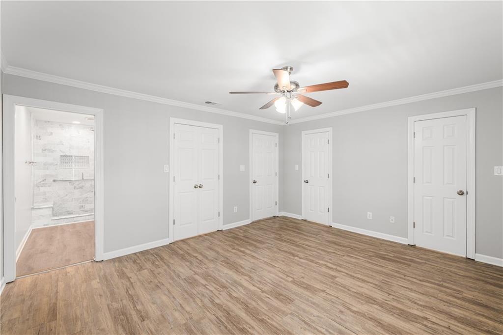 109 Mt Vernon Circle Sandy Springs, GA 30338 - Photo 24 of 37 wooden floor in an empty room with a window