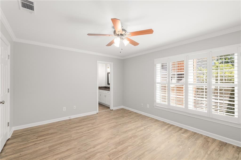109 Mt Vernon Circle Sandy Springs, GA 30338 - Photo 27 of 37 a view of an empty room with a window