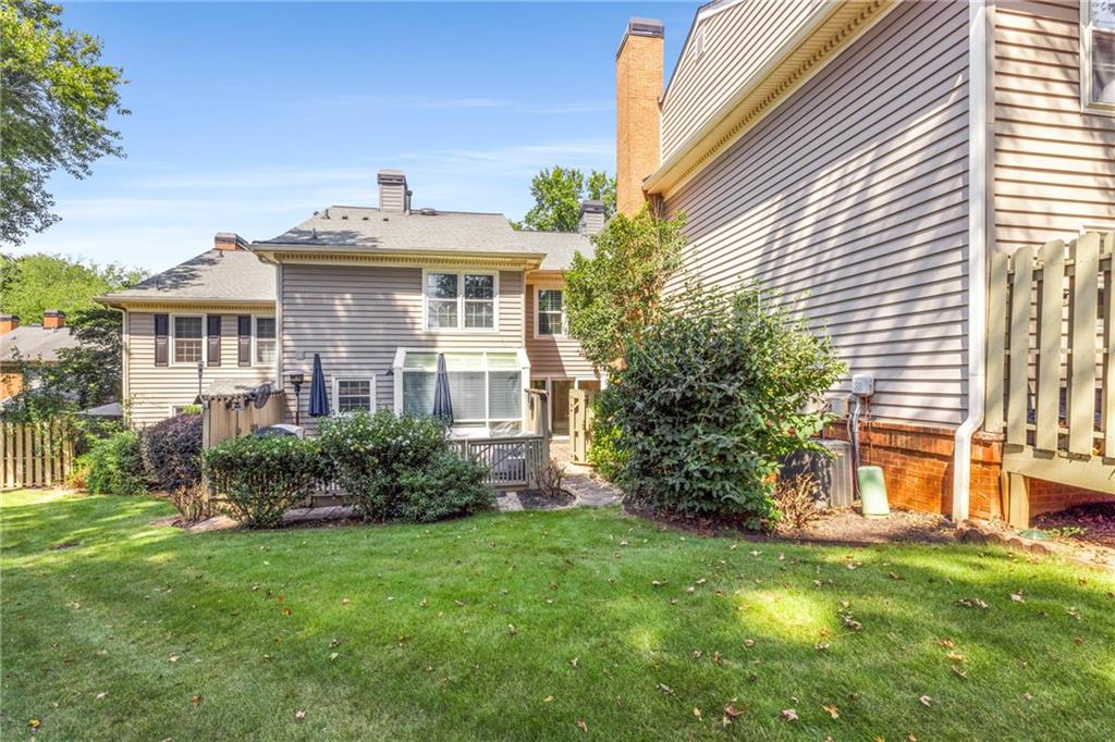 109 Mt Vernon Circle Sandy Springs, GA 30338 - Photo 32 of 37 a front view of a house with a yard