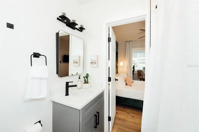 a bathroom with a sink and a mirror