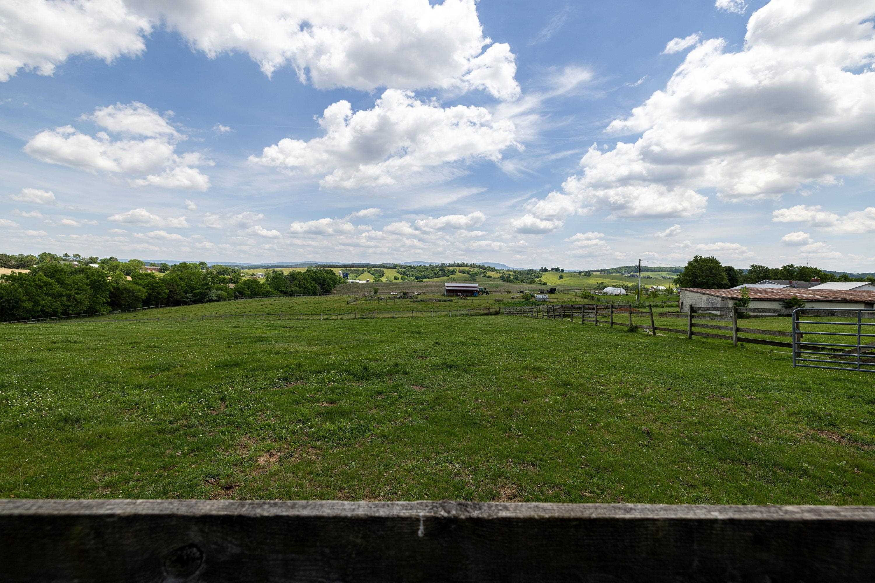 3980 Greenmount Road Harrisonburg, VA 22802 - Photo 64 of 75 The lot photos highlight the features of the wooden fence, level lot, and private surroundings of this lovely home.