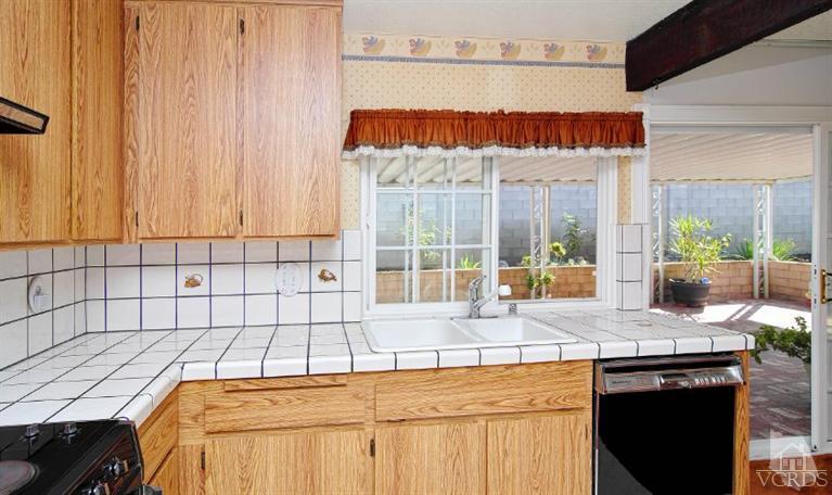 2796 Harrington Road Simi Valley, CA 93065 - Photo 13 of 15 a bedroom with a bed and a window
