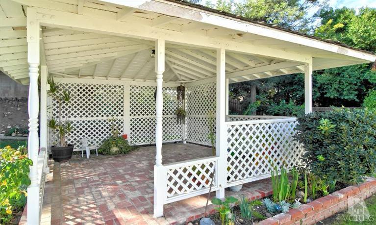 2796 Harrington Road Simi Valley, CA 93065 - Photo 8 of 15 a view of a porch with a garden