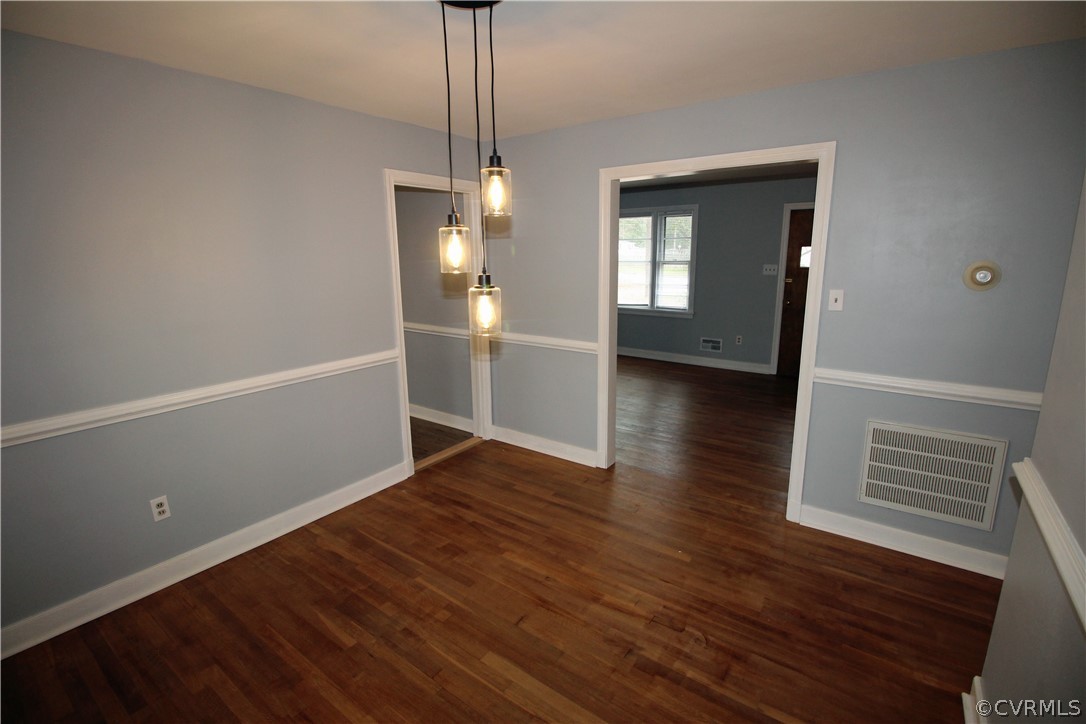12821 Old Buckingham Road Midlothian, VA 23113 - Photo 12 of 50 a view of empty room with wooden floor and window