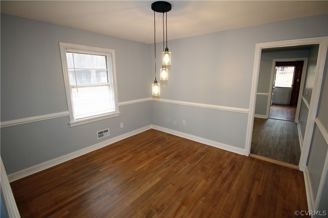 12821 Old Buckingham Road Midlothian, VA 23113 - Photo 13 of 50 a view of empty room with wooden floor and fan