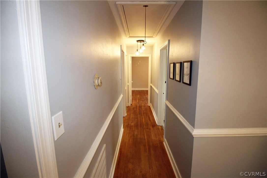 12821 Old Buckingham Road Midlothian, VA 23113 - Photo 15 of 50 a view of a hallway with wooden floor and staircase