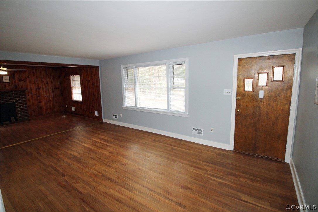 12821 Old Buckingham Road Midlothian, VA 23113 - Photo 16 of 50 an empty room with wooden floor and windows