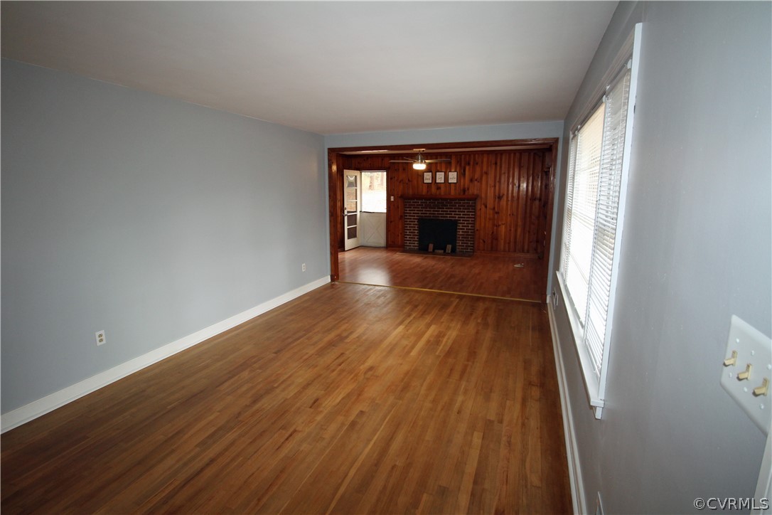 12821 Old Buckingham Road Midlothian, VA 23113 - Photo 18 of 50 wooden floor in an empty room with a window