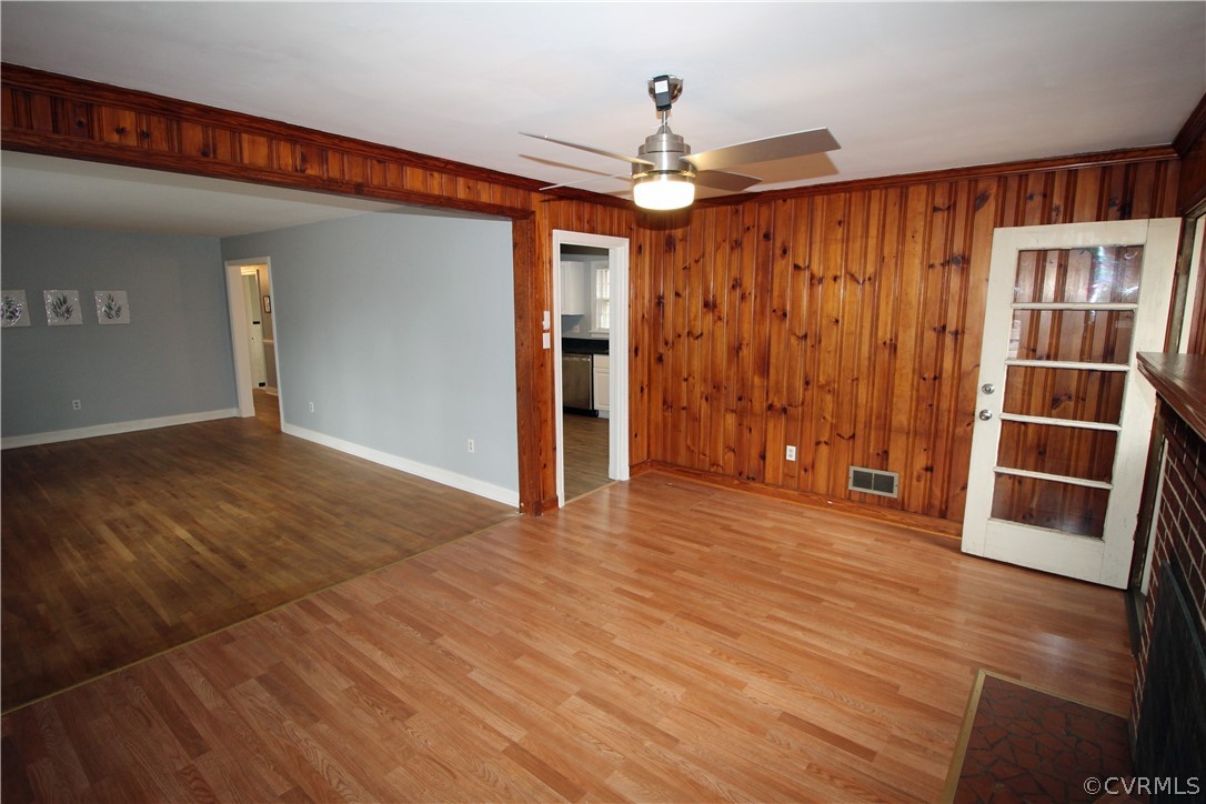 12821 Old Buckingham Road Midlothian, VA 23113 - Photo 22 of 50 a view of an empty room with wooden floor