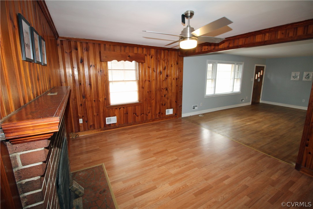12821 Old Buckingham Road Midlothian, VA 23113 - Photo 25 of 50 a view of an empty room with window and wooden floor