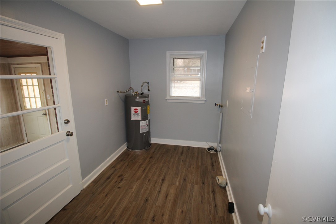 12821 Old Buckingham Road Midlothian, VA 23113 - Photo 35 of 50 wooden floor in an empty room with a window