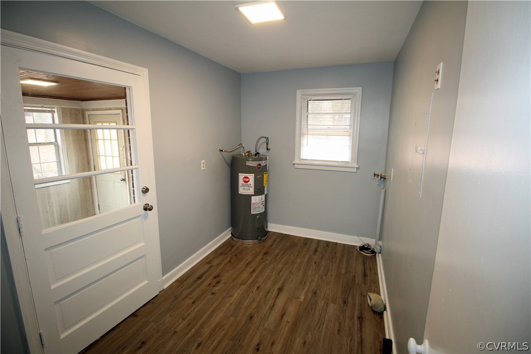 12821 Old Buckingham Road Midlothian, VA 23113 - Photo 36 of 50 wooden floor in an empty room with a window