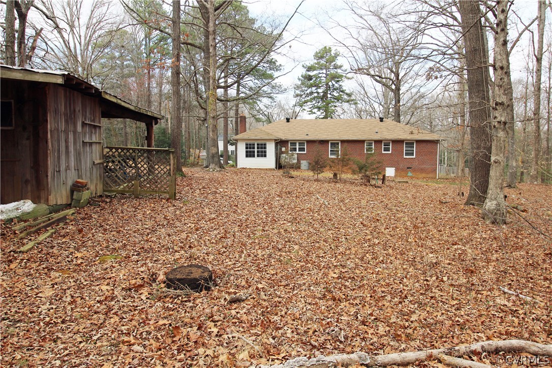 12821 Old Buckingham Road Midlothian, VA 23113 - Photo 44 of 50 a front view of a house with a yard