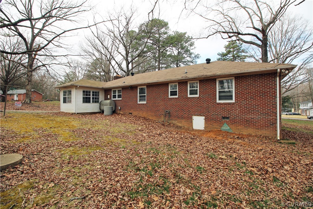 12821 Old Buckingham Road Midlothian, VA 23113 - Photo 45 of 50 a backyard of a house with lots of green space